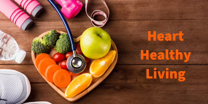 Heart shaped bowl with fruits and vegetables with tennis shoes, hand weights, stethoscope and water bottle