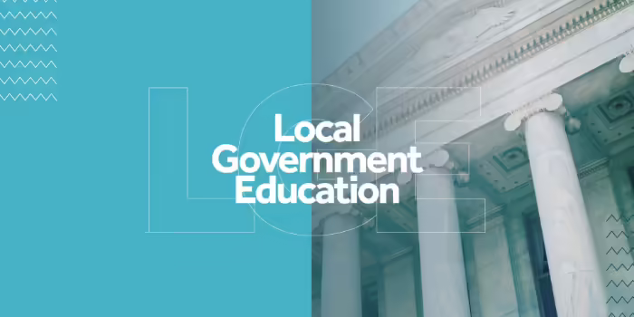 A government building with the text “Local Government Education” and “Illinois Extension,” along with the University of Illinois logo.