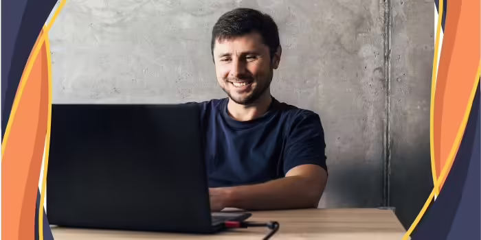 man working at a laptop