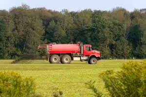 Manure spreader in field
