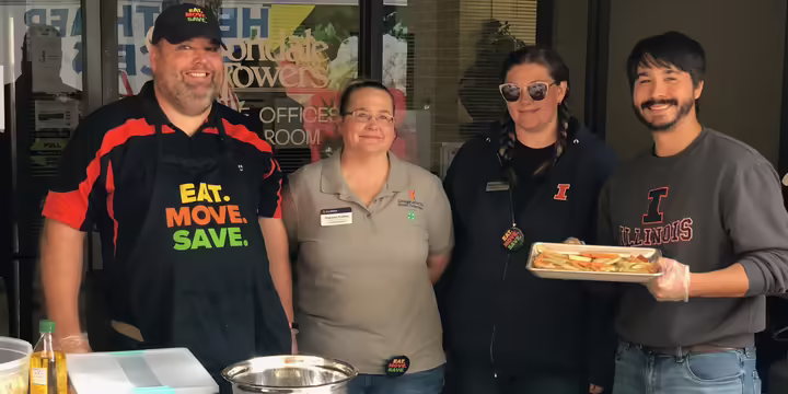 Four team members at a mobile kitchen event