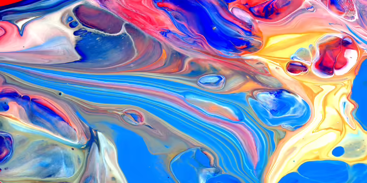 Paint swirls in blues, reds, and yellows.