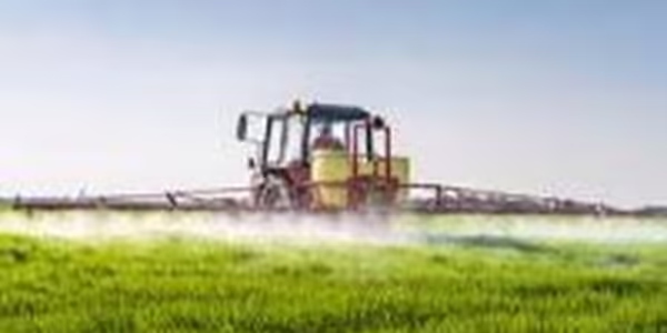 Machine spraying pesticide