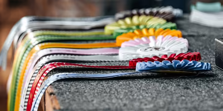 4-H Showmanship Rosette Ribbons on a table.