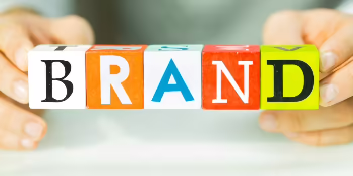 colored blocks spell "BRAND"