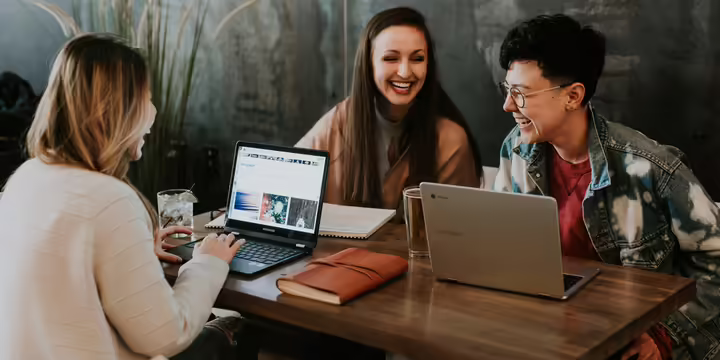 Group of college students smiling and laughing