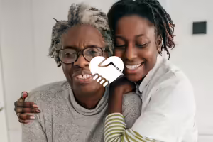 woman hugging older woman