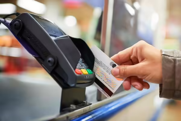 hand swiping credit card