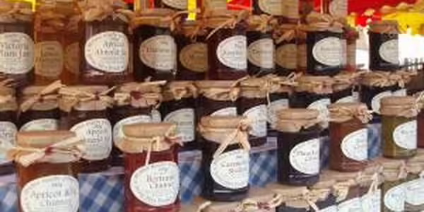Jars of canned jelly on a shelf