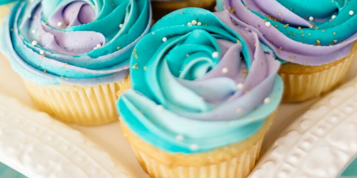 blue and purple frosted cupcakes