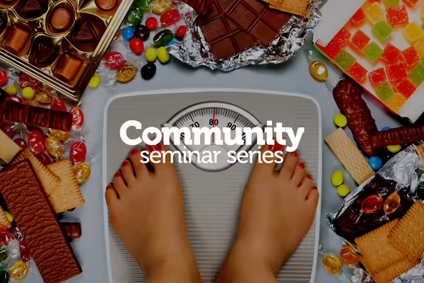 woman standing on sale with desserts around
