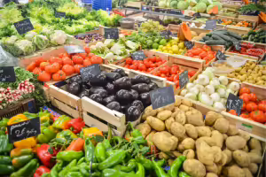produce at a market with beans, potatoes