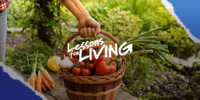 The words Lessons for Living with a person holding a basket of vegetables