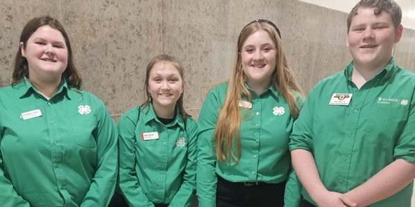 4-Hers pose for a picture during the 4-H legislative connection day in Springfield