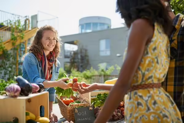 woman purchasing fresh produce