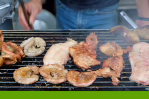 meat being cooked on a grill