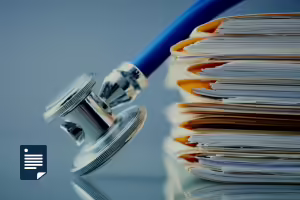 stack of medical papers and stethoscope