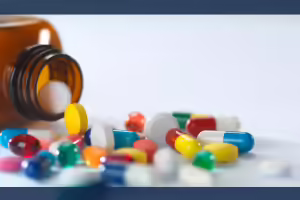 pill bottle with medicine scattered