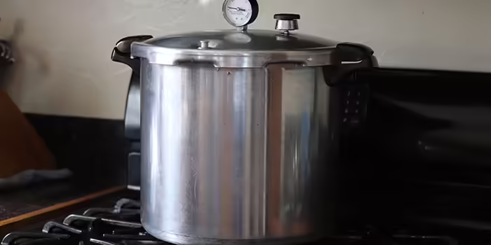 Pressure cooker on stove