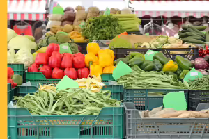farmers market produce stand with all sorts of vegetables 