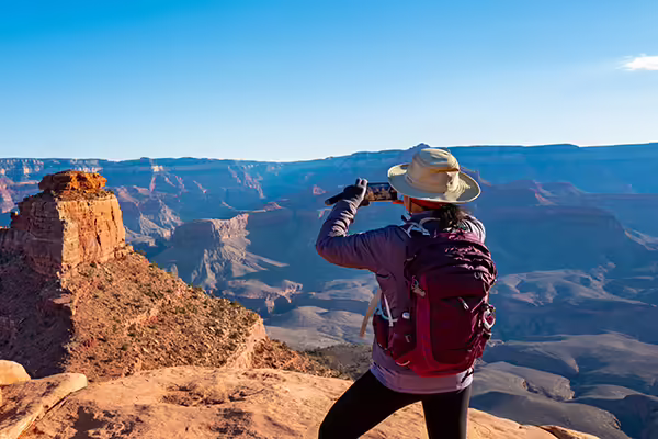 person overlooking canyon