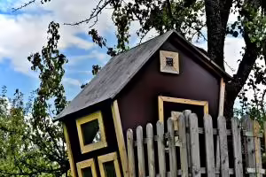 Tree house with clouds in the background