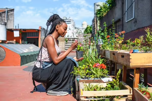 young woman in rooftop garden