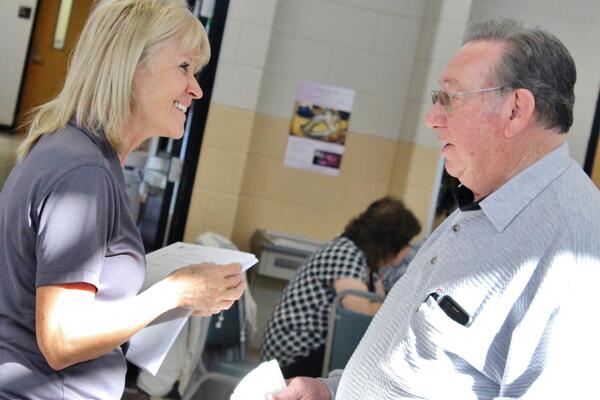 Health Consultant talks with Senior about nutrition