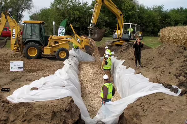 wood chip bioreactor installation in farm field