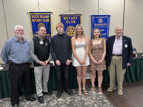 Bert Blood 4-H Scholarship Recipients, Matthew Callahan, Anna Taylor, Ella Goodnight (center) are flanked by 4-H Foundation president, John Flaherty, and Rotary VP Eric Westphall, (left) and Rotary member John Wetzel (right). 