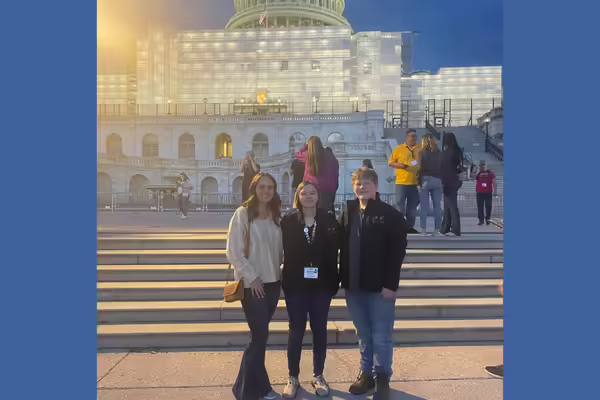 youth delegates pose by the Capitol