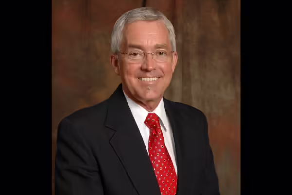 jerry hicks in a suit and tie