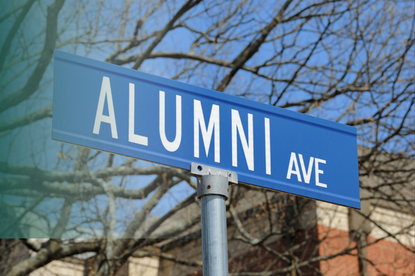 street sign says alumni avenue