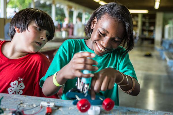 Youth building a robot