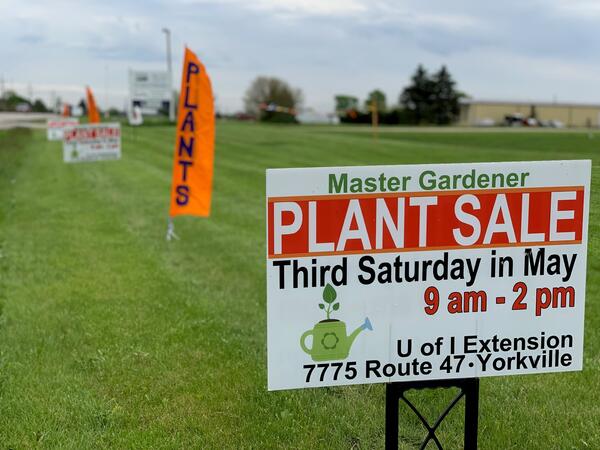 signs with Master Gardener Plant Sale