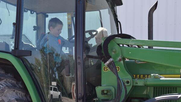 boy in a tractor