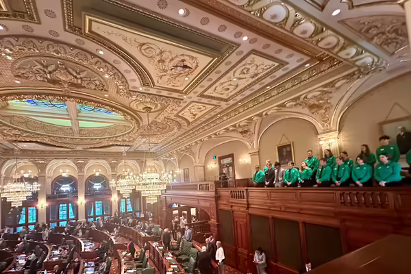 Teen leaders gaze at House floor.