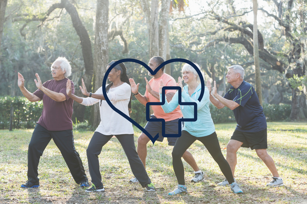 image of a group of people doing tai chi outdoors with a graphic of a cross and a heart.