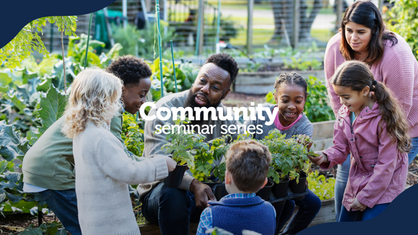 An adult withkids planting flowers and gardening