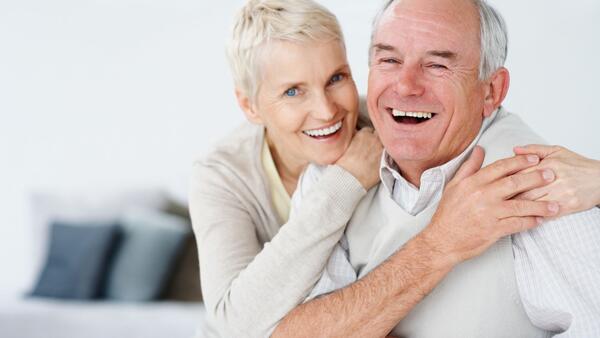 Man and a woman laughing together