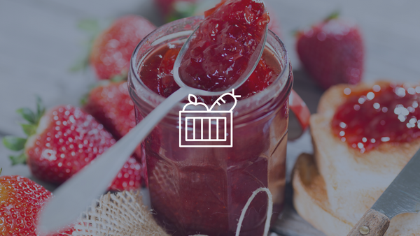 Strawberry Jam and spoon with graphic of produce basket.