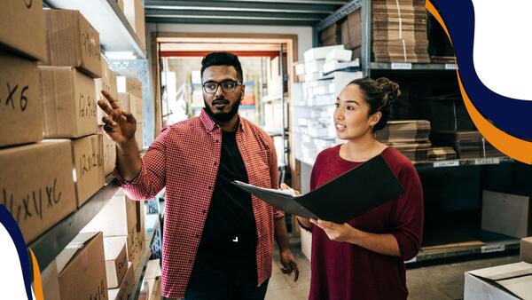 two people counting boxes