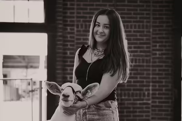 Kelsey showing a sheep
