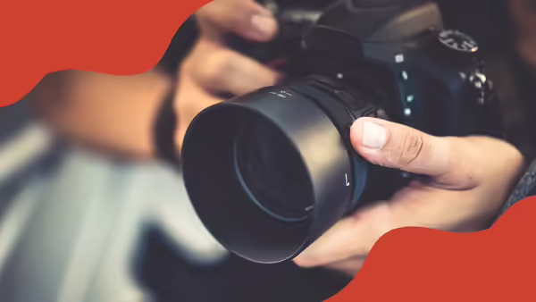 A person using a camera to take a picture.