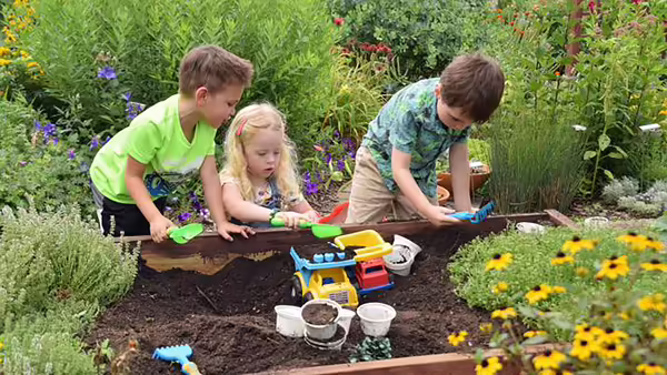 kids playing in a garden