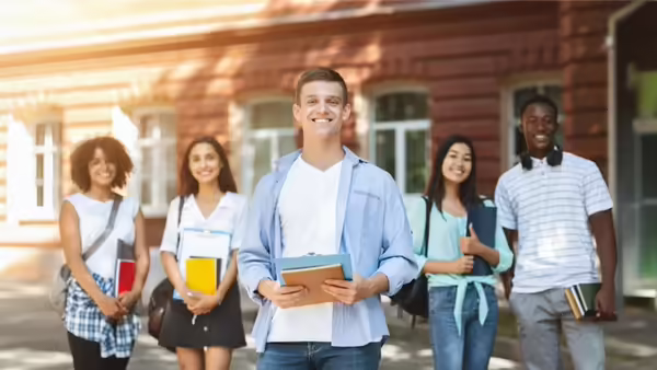 youth holding books