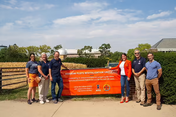A group of people in front of the morrow plots