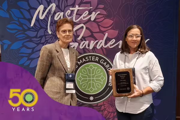 Master Gardener Volunteers hold their awards
