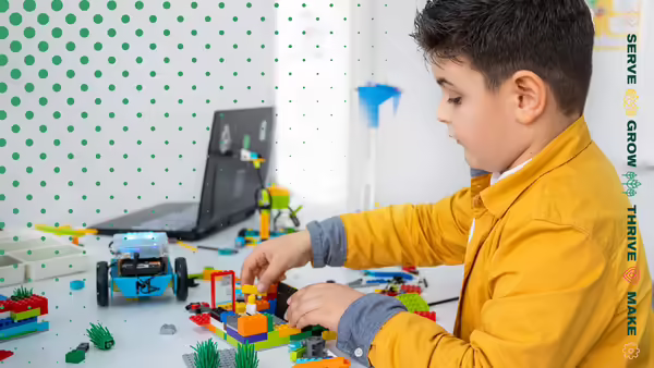 boy playing with Legos
