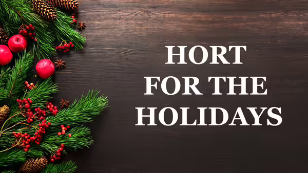 holiday garland scattered on a dark wood background. Text overlay reads: Hort for the Holidays